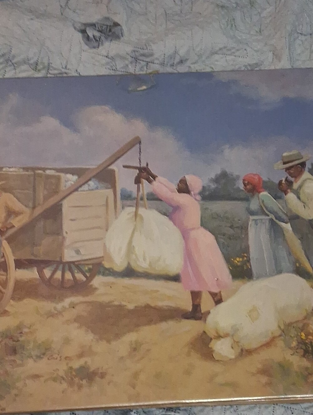This print is titled "Weighing Cotton"